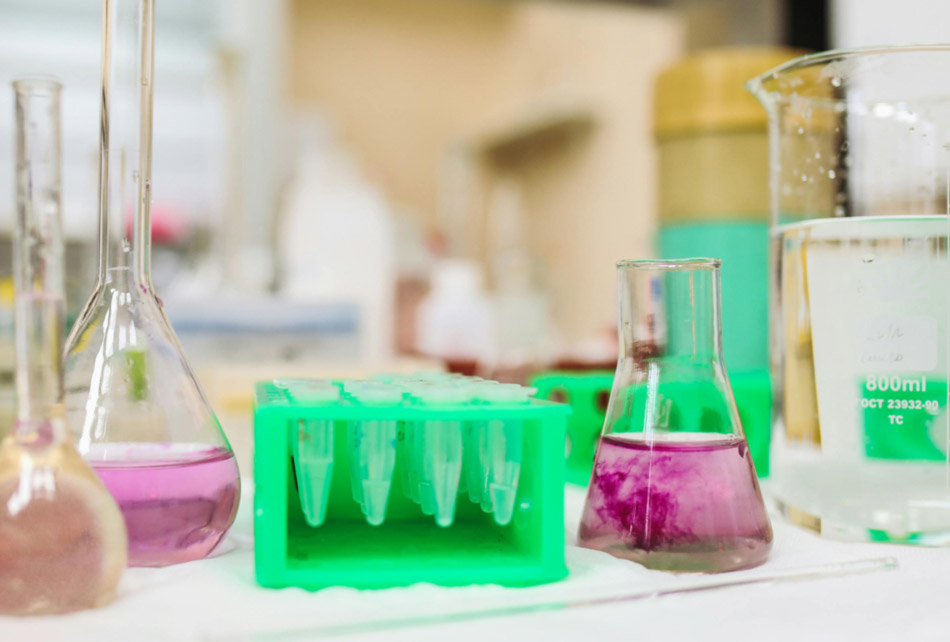 Laboratory glassware representing chemical analysis in air and water treatment blog